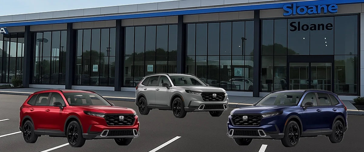 Three 2026 Honda CR-Vs in front of Sloane Honda.