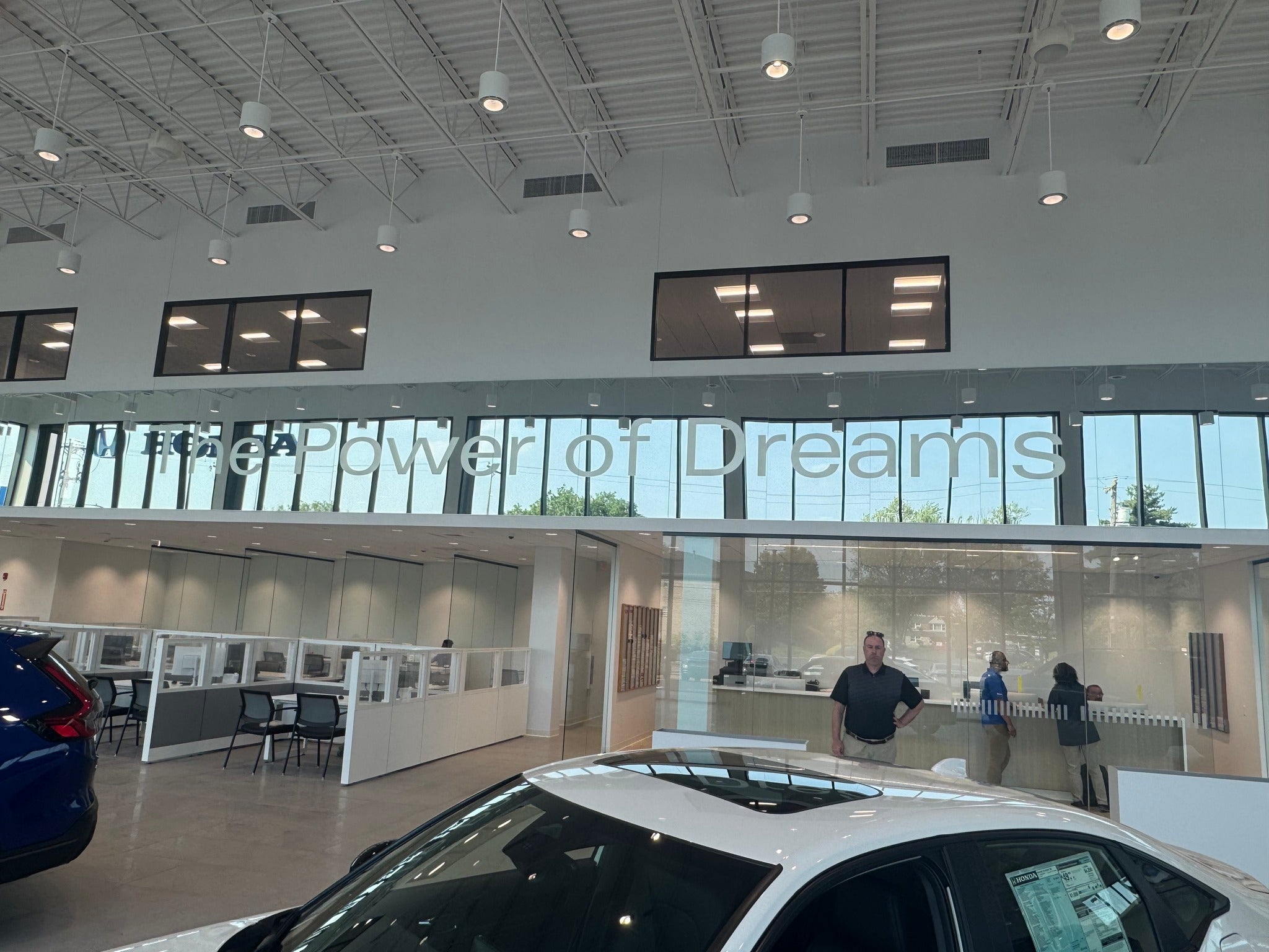 Power of Dreams sign in the Sloane Honda showroom.