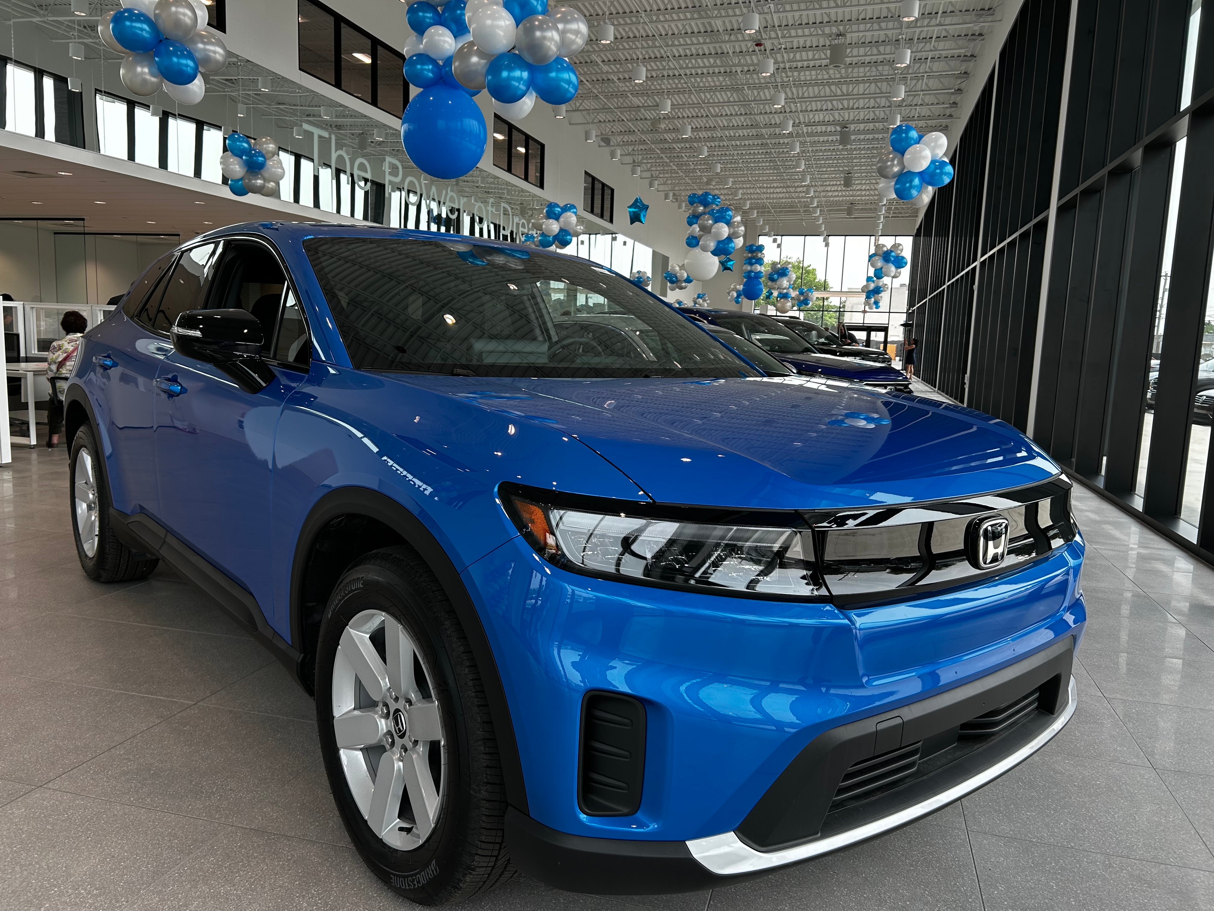 Pacific Blue 2024 Honda Prologue in the Sloane Honda showroom.