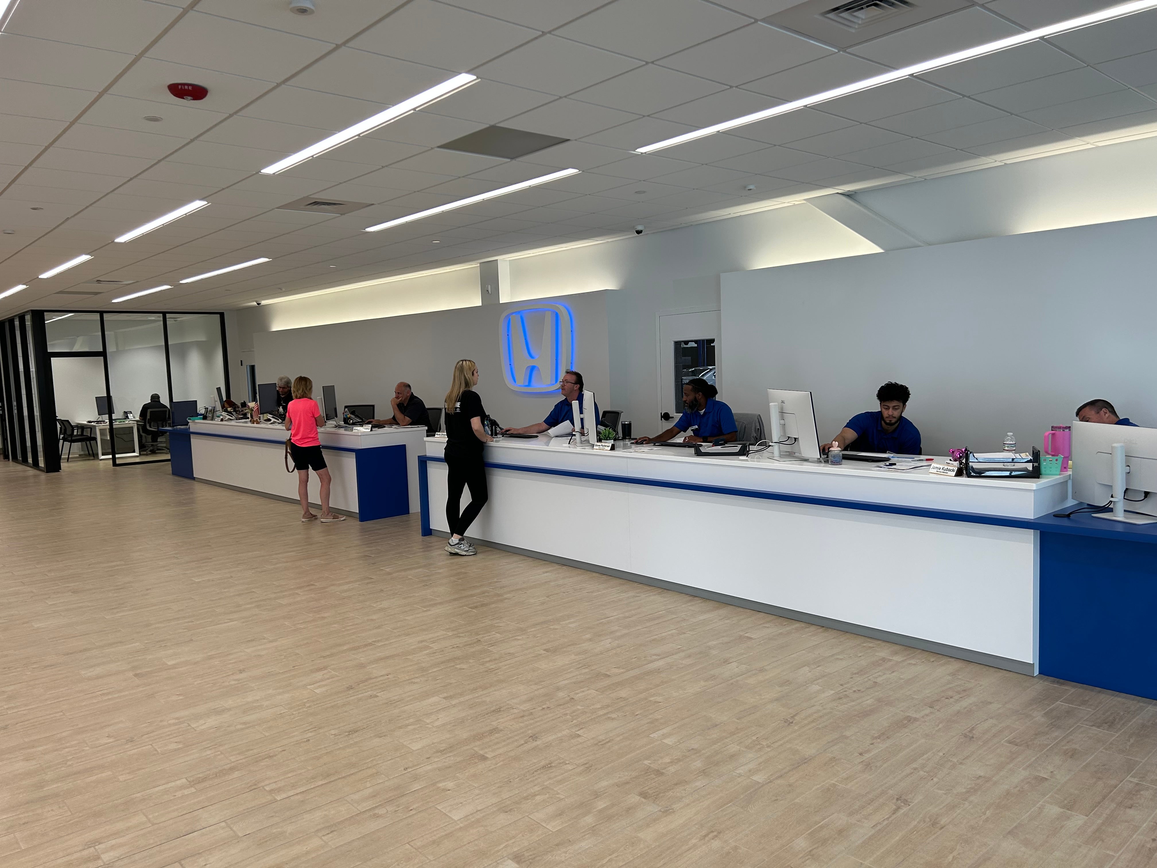 Customers checking out at Sloane Honda.
