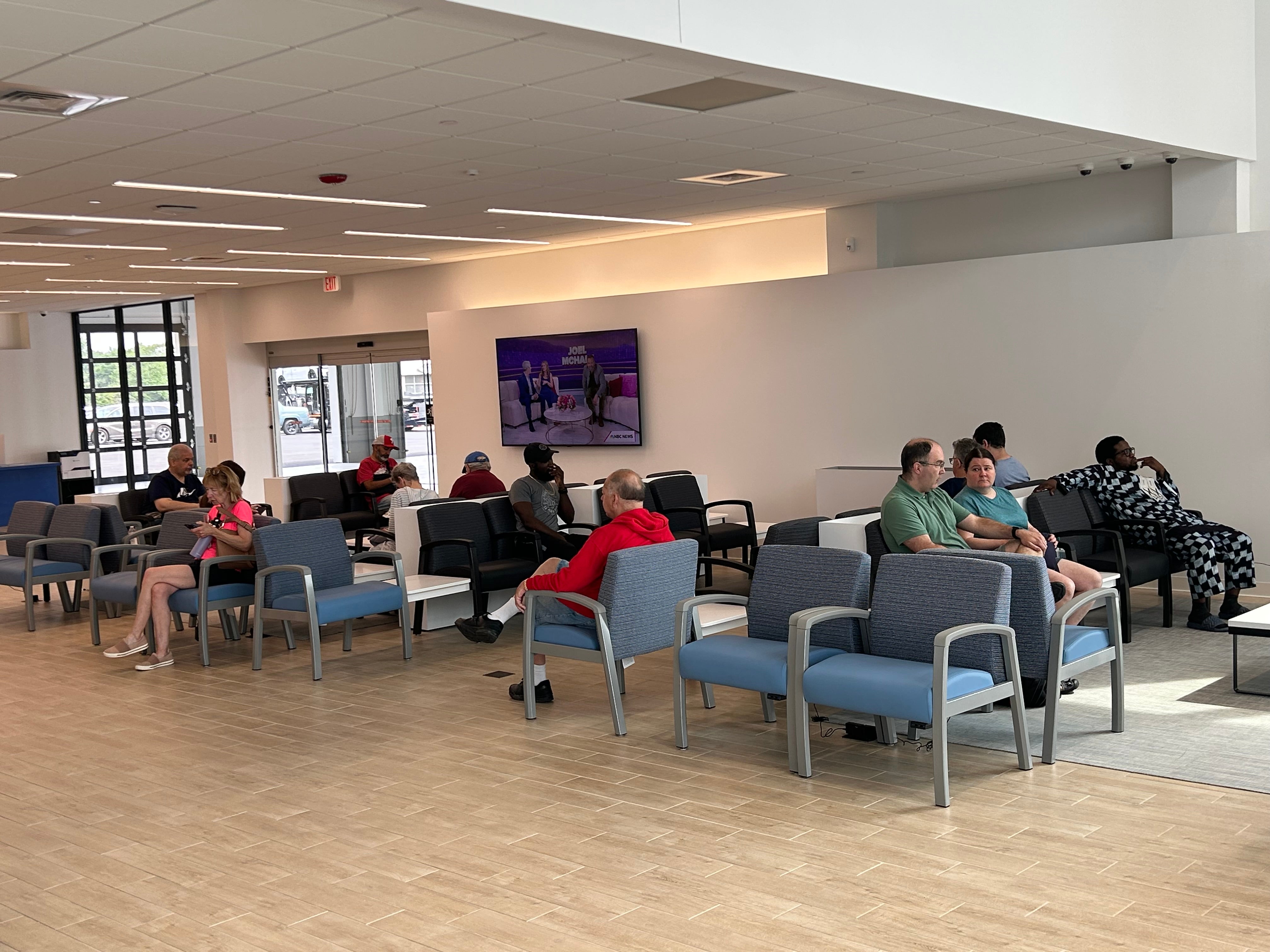 Customers relaxing in the new Sloane Honda waiting area.